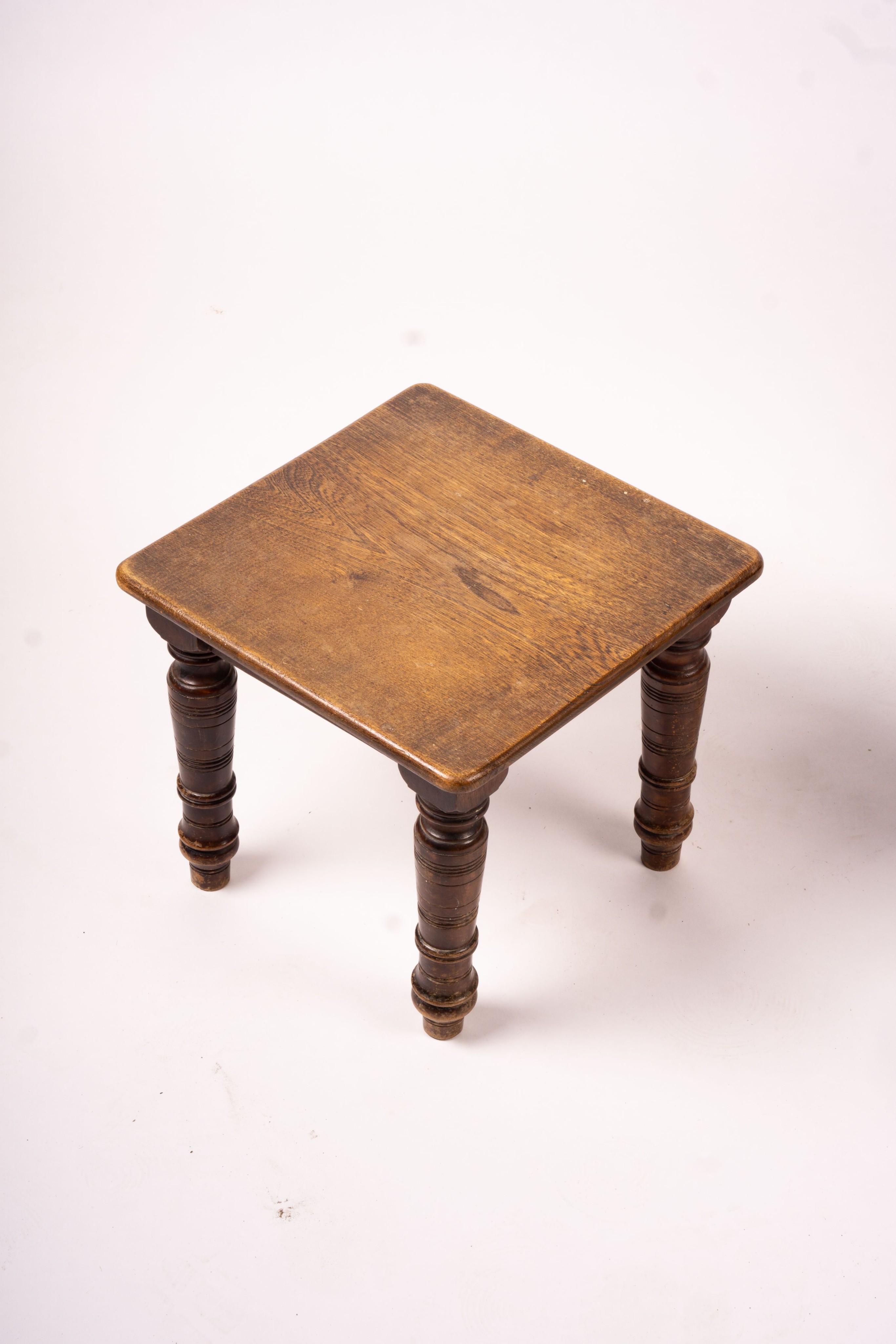 A Victorian salon chair, a Victorian side chair, square oak occasional table and a circular table